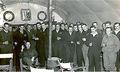 No 77 Squadron Association Korea photo gallery - 20 January 1953.  John Kinninmonts farewell.  Among those present are:  Jack Harker, Jack Kinninmont, John Hubble, Don Hillier, Vin Hill, Viv Shearn, Gus Goyne, Peter Cooney, Bugs Burley (RAF), Ted Jones, George Hale  (Viv Shearn)